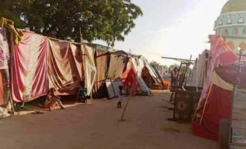civilians in Al-Hilaliya camp nearby a mosque of a local sofi leader