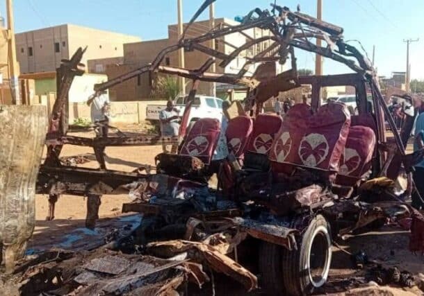 A minibus lies in ruins in Karari after being struck by a RSF shell, resulting in the tragic deaths of 22 passengers on Dec 10, 2024