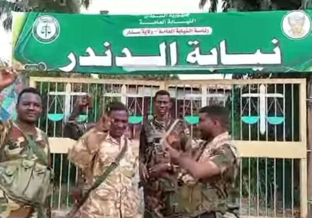 Sudanese soldiers outside the General prosecution office in Al-Dinider on Oct 23, 2024