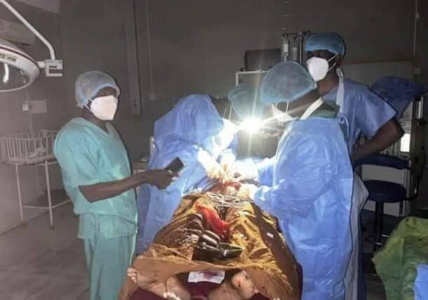 A medical team performs a caesarean section while a barrage of shells falls on the operating room at the Saudi Hospital on Jan 4, 2025