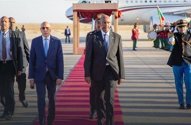 Mauritanian President Mohamed Ould Ghazouani, current head of the African Union, welcomes Sudan's Gen. Abdel Fattah al-Burhan to Nouakchott on January 13, 2025.