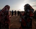 Survivors of sexual violence from the conflict in Geneina gather outside makeshift shelters in Adré Chad. Reuters file photo