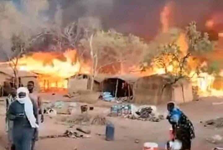 A woman flees the flames engulfing the Zamzam market on Feb 15, 2025