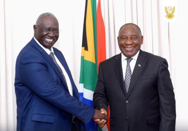 South African President Cyril Ramaphosa shakes hands with Sudan's Deputy Chairman of the Sovereign Council, Malik Agar, on March 18, 2025.