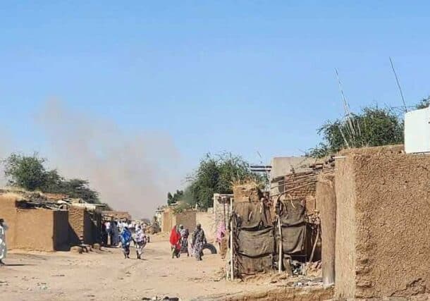 Residents of Abu Shouk camp look on as the Sudanese army shells the area on January 3, 2025