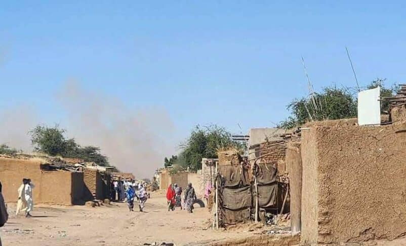 Residents of Abu Shouk camp look on as the Sudanese army shells the area on January 3, 2025