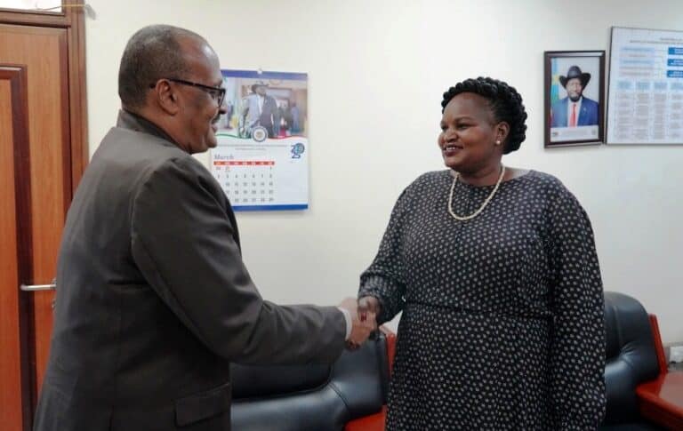 Undersecretary, Ambassador Agnes Adlino Orifa Oswaha shakes hand with Sudanese Ambassdor to Juba Isam Mohamed Karrar on March 24, 2025
