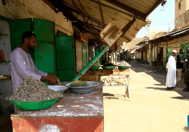 A trader is seen in the Grand Market of Omdurman, near Sudan's capital Khartoum, on November 13, 2024