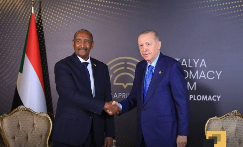 Burhan shakes hands with Erdogan on April 12, 2025