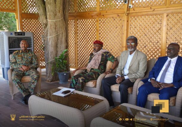 Commander Mohamed Bashara Yahya (L) and some leaders of his faction meet general al-Burhan on April 20, 2025.