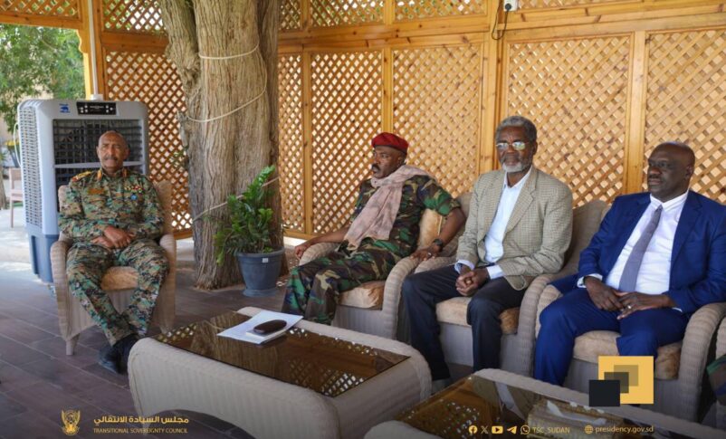 Commander Mohamed Bashara Yahya (L) and some leaders of his faction meet general al-Burhan on April 20, 2025.