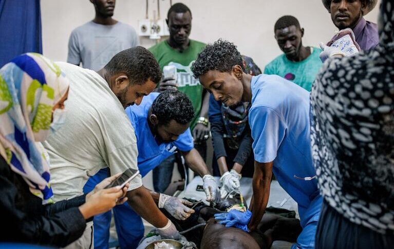 Doctors attempt to resuscitate a victim of shelling at the Al Nao Hospital in Omdurman, on September 5, 2024 - NPR photo
