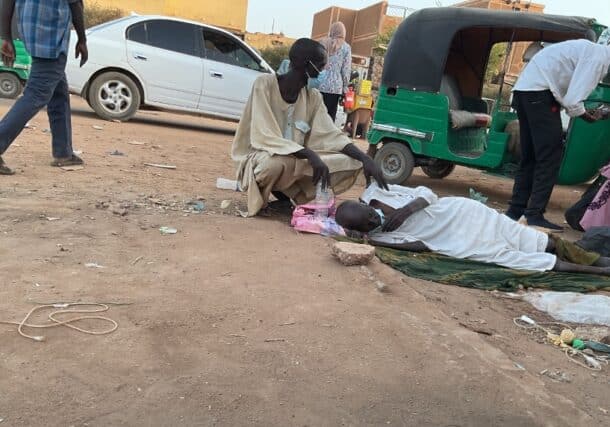 A cholera patient lies on the ground outside Al-Nao Hospital in Omdurman. (Photo Sudan Tribune) 950