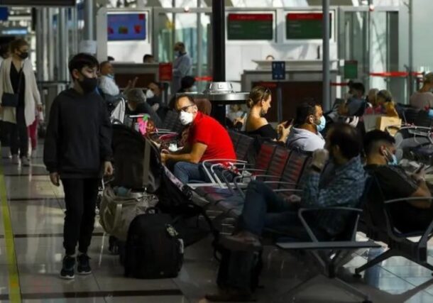 Passengers wait before boarding at Dubai International Airport, Reuters file photo