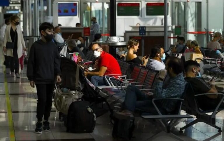 Passengers wait before boarding at Dubai International Airport, Reuters file photo