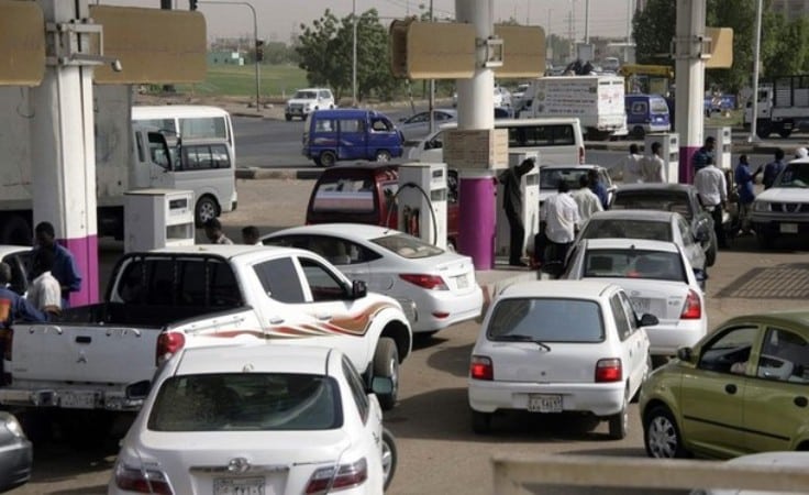 People wait to get fuel for their vehicles at a petrol station in Khartoum, Reuters file photo