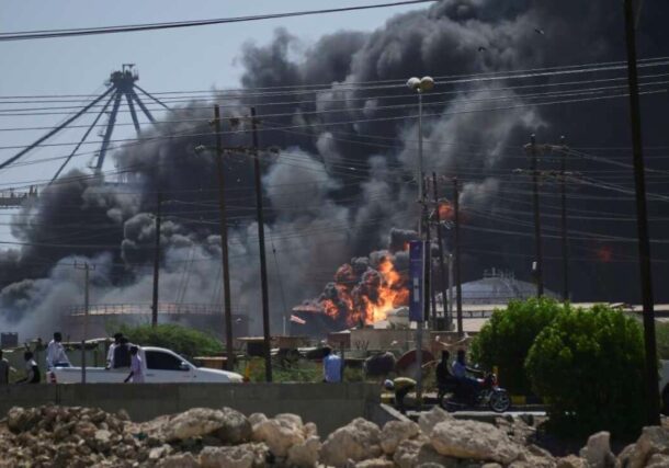Smoke billows after drone strikes by the paramilitary RSF targeted the northern port in the Red Sea city of Port Sudan, on May 6, 2025 AP photo