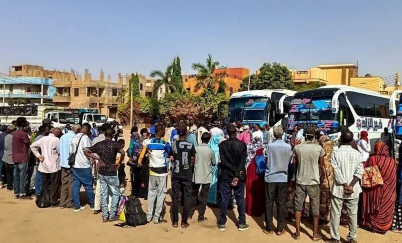 The first group of refugees gather in Khartoum on May 29, 2025, ahead of their repatriation.