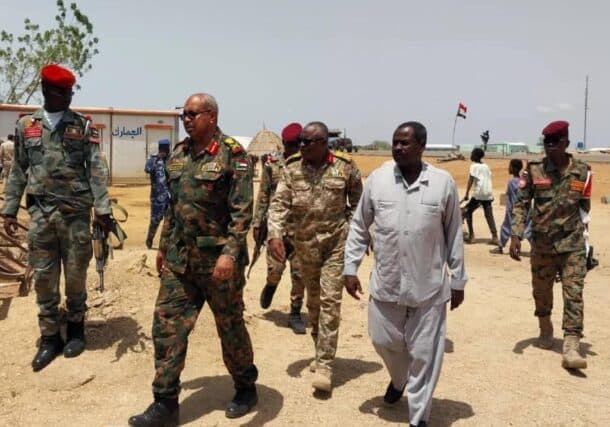 Yahia Al-Fadil Ibrahim (R) executive director of Al-Jabalain locality in White Nile state, inspects the Juda crossing with South Sudan on May 24, 2025.