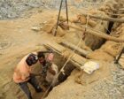 Gold mine workers climb out from a mine in Al-Ibedia, River Nile State, Reuters file photo
