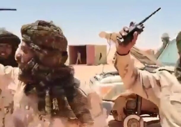 RSF elements celebrate the capture of the Karb al-Toum located near the Jebel Arkenu mountain range in the Northern State, on June 16, 2025