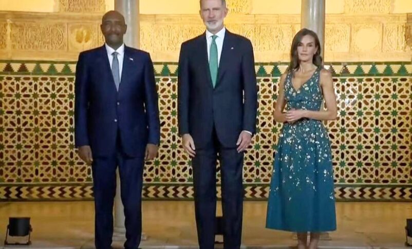 Sovereign Council Head Abdel Fattah al-Burhan pose with Spain's King Felipe and Queen Letizia after his arrival in Seville on June 29, 2025