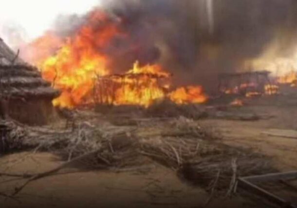 A village burning in Darfur, file photo