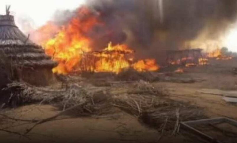 A village burning in Darfur, file photo