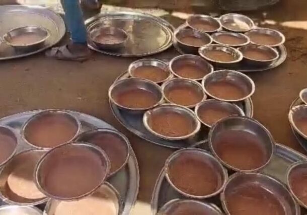 A meal made from 'Ambaz', an animal feed byproduct, is prepared by volunteers in El Fasher, Sudan, July 26, 2025,