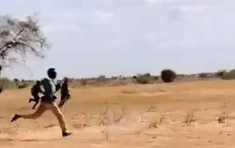 RSF fighters flee the Joint Force troops (unseen) outside Um Sumaima, North Darfur, on July 13, 2025