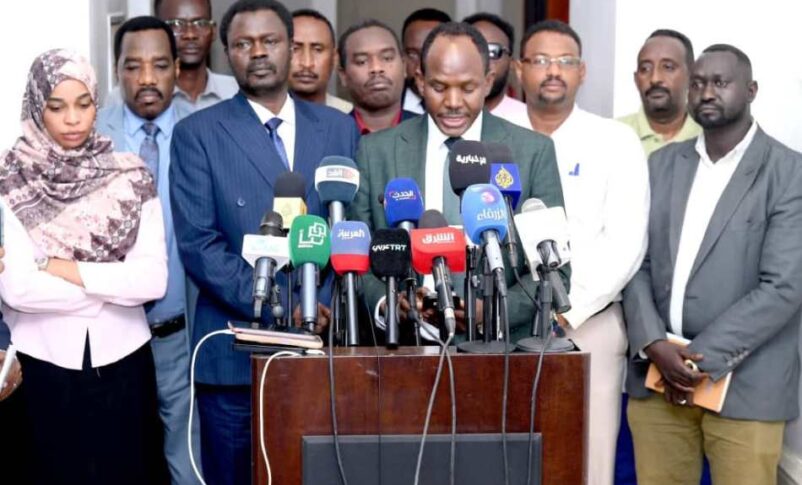 SLM leader Minni Minawi (L) and Mohamed Zakaria JEM spokesman speak to the press in Port Sudan on July 13, 2025
