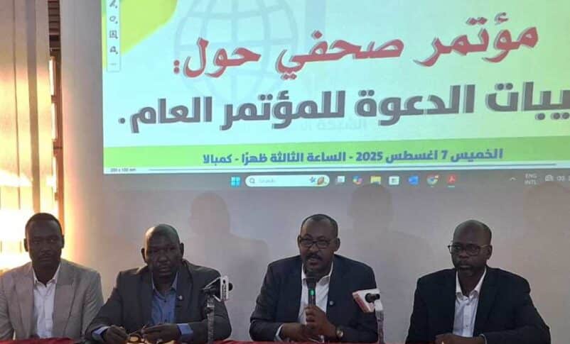 An SLM breakaway group holds a press conference in Kampala on August 7, 2025