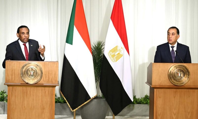 Sudan's PM speaks to reporters in a joint press conference with his Egptian coupterpart in Cairo on August 7, 2025