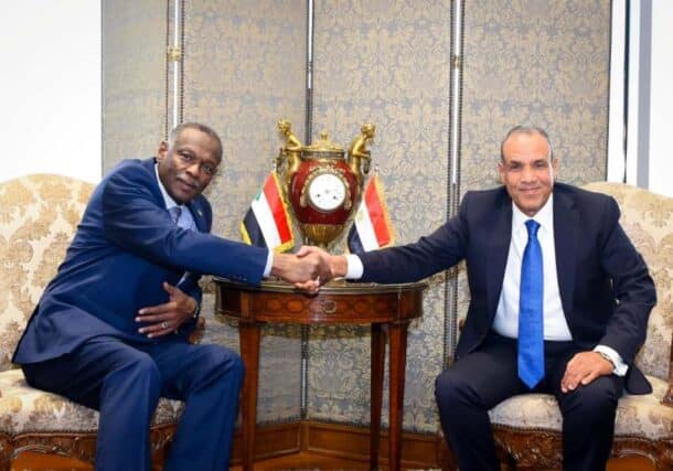 Egyptian Foreign Minister Badr Abdelatty greets his Sudanese counterpart, Omer Siddiq, in Cairo on September 3, 2025