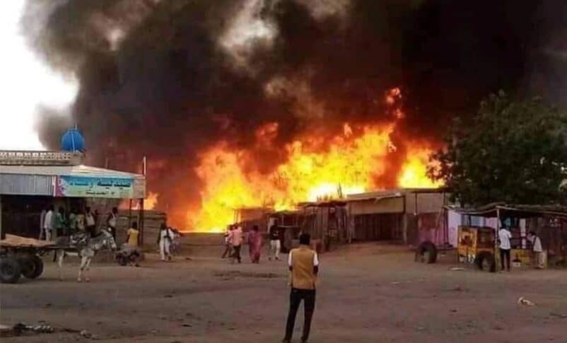 Fires burn at a market after shelling in al-Fasher, North Darfur, Sudan, in this undated handout AFP photo.