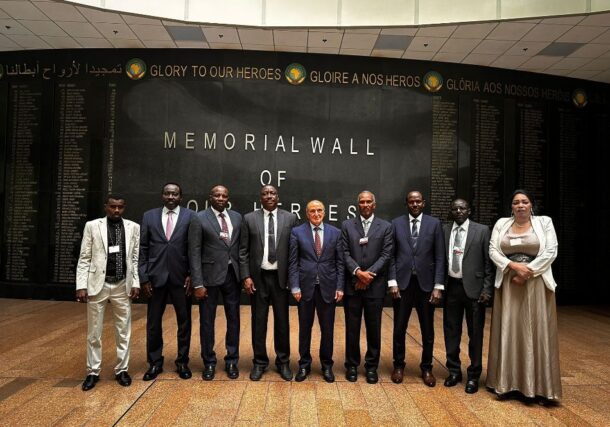 Representatives of political groups allied with the Sudanese army pose with the African Union envoy for Sudan in Addis Ababa, Ethiopia, September 23, 2025.