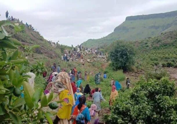 Villagers search for survivors in the rubble after a landslide in Jebel Marra on September 1, 2025