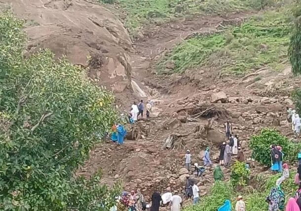 Villagers search for survivors in the rubble after a landslide in Jebel Marra on September 1, 2025