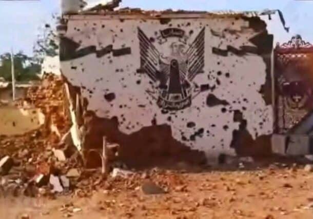 A wall at the 6th Army Division base shows damage from projectiles after being captured by the RSF in El Fasher on October 26, 2025.