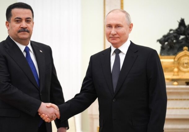 Iraqi Prime Minister Mohammed Shia Al Sudani (L) meets Russian President Vladimir Putin