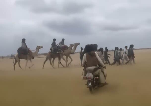 Mounted and motorized SRF forces surround and intercept civilians attempting to escape the conflict in El Fasher, on October 9, 2025