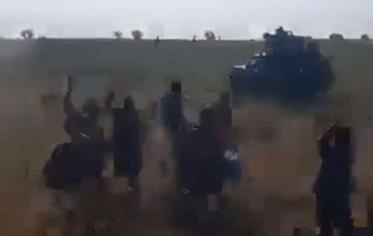 RSF fighters in a vehicle pursue civilians fleeing El Fasher on October 27, 2025. (See the video on ST page on X platform.