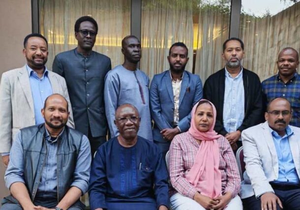 IGAD Special Envoy for Sudan, Lawrence Kurbandi, and his team pose with a Somoud delegation after a meeting in Nairobi on November 1, 2025