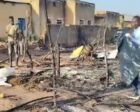 People gather at the scene of a drone strike in Kadugli to recover the bodies of victims on Nov. 1, 2025.