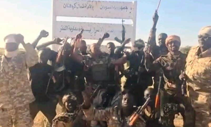 Sudanese soldiers pose at the entrance of Kazgail, North Kordofan, on Nov 15, 2025
