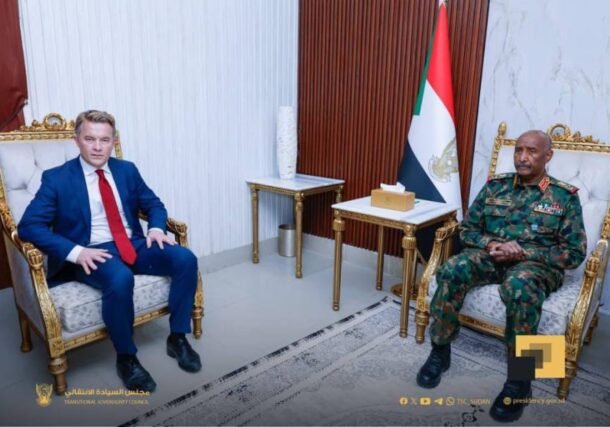 Sudan's Sovereign Council Chief Abdel Fattah al-Burhan receives Norway's State Secretary Andreas Motzfeldt Kravik on November 27, 2025