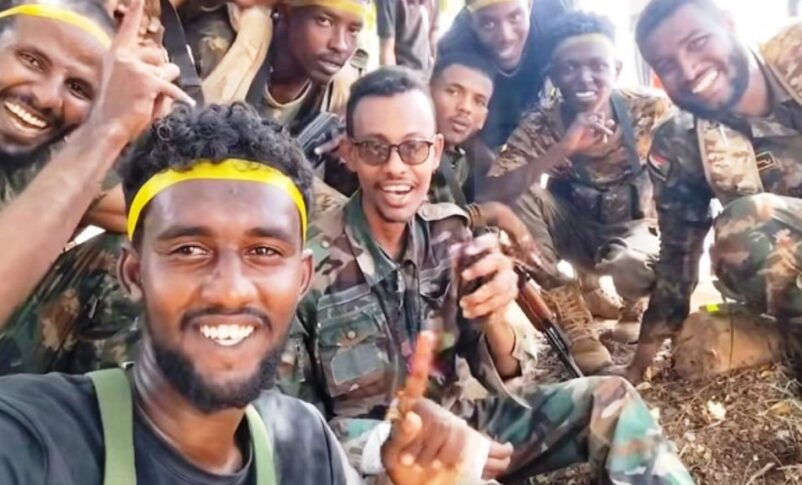 Undated photo showing Al-Baraa bin Malik Brigade Commander, Al-Misbah Abu Zaid Talha (C), surrounded by members of his unit.