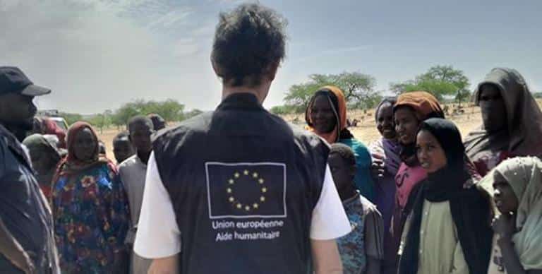 EU humanitarian workers speaks to Sudanese refugees in Chad in June 2023, EU photo