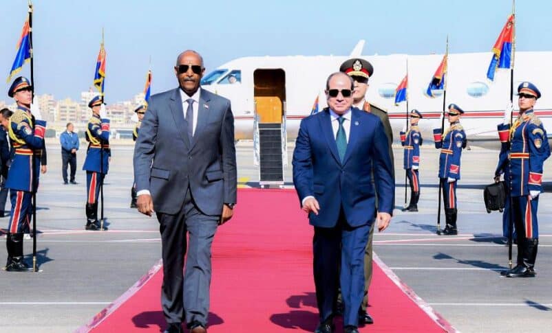 Egyptian President Abdel Fattah al-Sisi receives Sudan's Sovereign Council Chairman ABdel Fattah al-Burhan at Cairo Airport on Dec 18, 2025