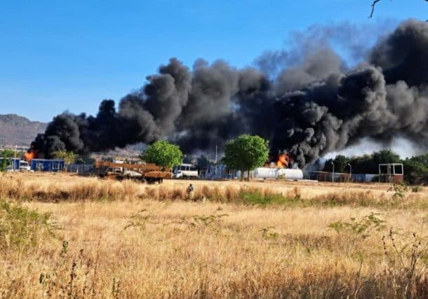 Smoke rises from the UNISFA compound following a drone attack in Kadugli, December 13, 2025.